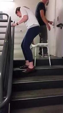 Climbing the stairs using shower chair