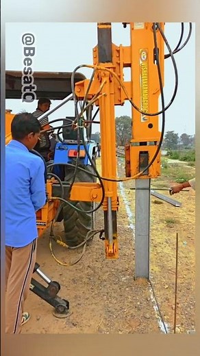 Tractor Pile Driver Installing Concrete Posts Fast