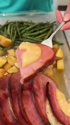 Scrumptious one pan ham dinner Olivia uses pre-cooked ham, pineapple, potatoes, green beans, seasonings, oil, apple juice, brown sugar, honey and mustard to create an easy, yummy ham dinner. This original video was produced by Network Media LLC and Olivia | Olivia