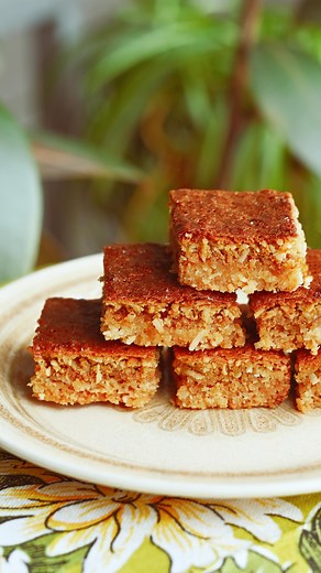 Paola Bacchia on Instagram: "Mamma’s old fashioned coconut slice - there is a special story behind this one, one that you won’t find in my book “At Nonna’s Table”, one that tugs at the heart strings. I have been telling at my book events and when I do there is a big sigh from those in the audience. Speaking of which - THANK YOU to everyone who came along to @booksforcooksau and @readingsbooks last week. In case you have not bought the book (yet!) I have popped the recipe for this special slice b