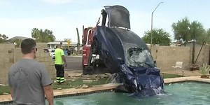 ‘Sounded like an explosion’: Tesla crashes through wall, lands in backyard pool