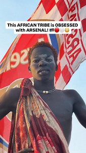 🇸🇸 This African tribe is obsessed with Arsenal. Meet the Dinka people of South Sudan, who make up 35% of the country’s population and are known for being some of the tallest on the planet. I had the lucky chance to experience daily life with them in one of their remote cattle camps. While football is loved here, wrestling is their main sport and is taken very seriously. Interestingly, we found that fighters have ultras who use European club logos as their badges! 😅 #travel #viral #backpacking