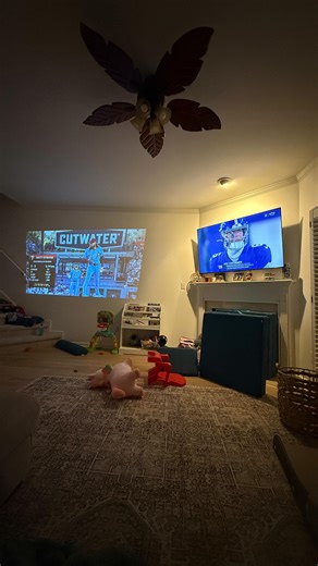 Javi Marroquin on Instagram: "If you are a divided household like us during football season then you need this mini projector! Comment “projector” and I’ll send you the link directly… GO BIRDS!"