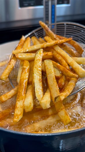 Boyd Brown III on Instagram: "The crispiest French fries you’ll ever make! 🍟 Perfectly golden, crunchy on the outside, fluffy on the inside, just how fries should be! Double fried for that next level crisp. 🤌🏾 Crispy Double Fried French Fries Ingredients: 4 large Russet potatoes (cleaned) Cold ice water 1 tsp salt (for soaking) 2 tbsp cornstarch Neutral oil (vegetable, canola, or peanut) for frying Salt, to taste Instructions: Prep the Potatoes – Cut the ends and sides of the potatoes to squa