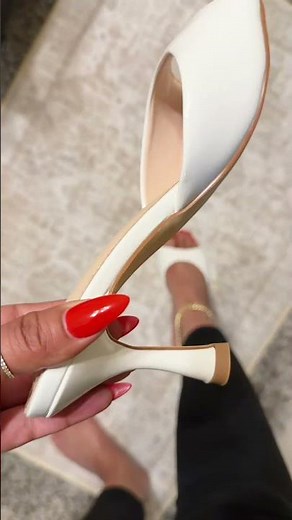 A timeless white mule heel is the easiest way to make any outfit feel polished and elegant