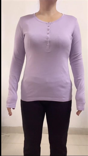 Shorten a T-shirt that has long sleeves and a long back.