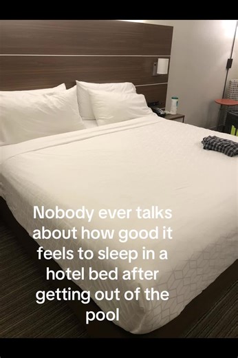 The Joy of Sleeping in a Hotel Bed After Swimming