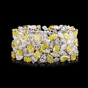 Illuminating colour. • Yellow and white diamond bracelet, 96cts #graffdiamonds #highjewelry #yellowdiamonds | Graff