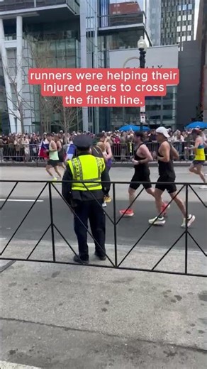 Marathon runners support each other to cross the finish line together | Humankind #shorts #goodnews