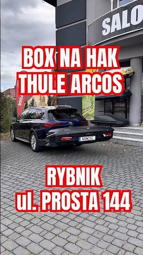 THULE ARCOS - BOX with a towbar that holds skis