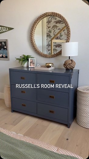 Amber Lancaster on Instagram: "Russell’s dino dreams came true! His new bedroom is officially complete, and I’m so excited to share the reveal — featuring the most adorable dinosaur wallpaper and timeless pieces from @potterybarnkids. From cozy bedding to playful storage and everything in between, this space was designed for adventure, imagination, and sweet dreams.  練 ☁️ #pbkpartner #boysbedroomideas #dinosaurbedroom #bigboybedroom"