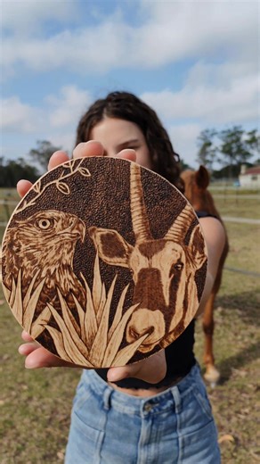 This artwork was inspired by the Karoo and its wildlife. I experimented by trying a new technique while creating the gemsbok, the Martial eagle, and the plant elements. Animals play a big role in my work, and this piece reflects my appreciation for their resilience and presence. 🌿🦌🦅 #eagle #martialeagle #gemsbok #karoo #karooart #pyrography | KayBurn Art