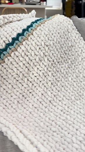 Coastal Comfort is one of my favorite blankets that I make! These are great gifts for the ocean lovers in your life 🥰 #fingerknitting #fyp #chunkyblankettutorial #handknitblanket #falldecor #handknit #diyhomedecor #etsycreatorco #chenilleblanket #chunkyknitblanket #handmadeblanket #armknitting