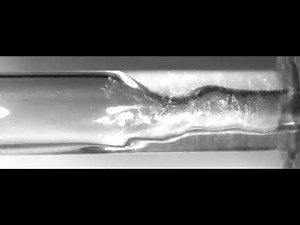 Fluid Dynamics Within the Vortex Fluidic Device