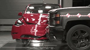 Tesla’s 1st Ever YouTube Ad Shows a Model Y Getting Run Over by a Silverado Pickup Truck