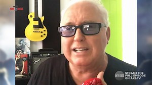 Loverboy’s Mike Reno talks about being a drummer before a lead singer. | AXS TV