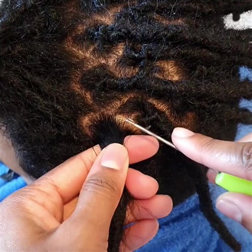 Dreadlock maintenance using the interlocking and crochet techniques on Afro hair. #dreads #locs #locks #dreadlocks #loclivin #locnation #dreadhead