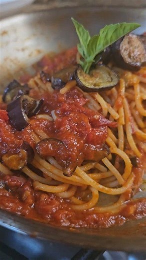 Authentic Sicilian Spaghetti alla Norma recipe with fried eggplant, tomato sauce, fresh basil, and ricotta salata — a traditional pasta dish from Catania, Sicily. All the comforting Italian flavors we love in just one pan. This is a vegetarian pasta recipe that even meat lovers will enjoy! Gather your ingredients, comment the word pasta, and I'll send the recipe directly to your inbox ✅️ Ingredients ✅️ ✅️ pasta ✅️ eggplant ✅️ marinara sauce ✅️ hot pepper flakes ✅️ onions and garlic ✅️ olive oil 