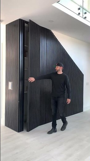 Slat wall hidden doors One of the easiest ways to have a hidden door is with vertical slats