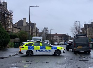 Police lock down Edinburgh street following attempted murder | Edinburgh Evening News