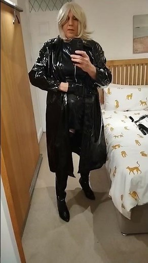 PVC raincoat, dress and thigh boots