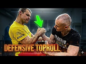 Janis Amolins Defensive Toproll: Expert Arm Wrestling Guide