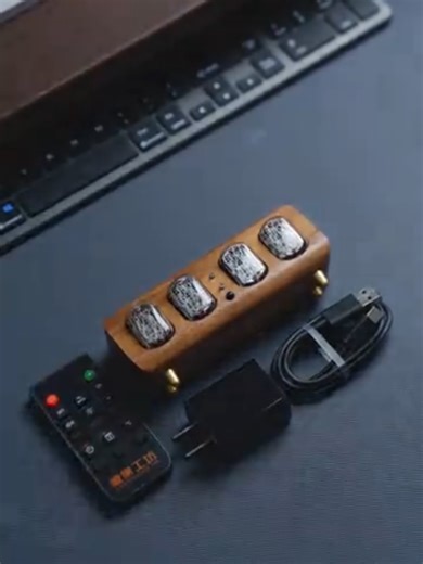 IN12 Nixie Tube Clock Soviet Cyberpunk Digital Display Watch Features: .Vintage Glow Tube Technology: Utilizes IN12 Nixie tubes filled with neon gas, which glow through glow discharge when electrified, producing a mesmerizing and nostalgic warm orange light. .Anti-Cathode Poisoning Program: Features an automatic cycling function that periodically lights each cathode evenly, effectively preventing cathode poisoning and significantly extending the lifespan of the tubes. .High-Temperature Resistanc