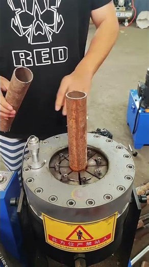 Steel Pipe Shrinking Machine in Action