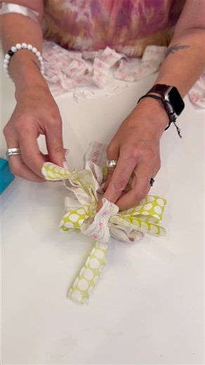 4.7K views · 52 reactions | From Rags to Ribbons: Whimsical DIY Bow Magic ✨ Who knew a few wood dowels and fabric scraps could turn into something this cute?! ✨ This DIY rag bow is perfect for gifts, home decor, or just adding a little whimsical charm to your life. Simple, budget-friendly, and no sewing required!  Would you rock this on a wreath or a wine bottle? #DIYDecor #SimpleDIY #WhimsicalStyle #UpcycledCrafts #BowTutorial #TrashToTreasure | Trina Transfixed | Facebook