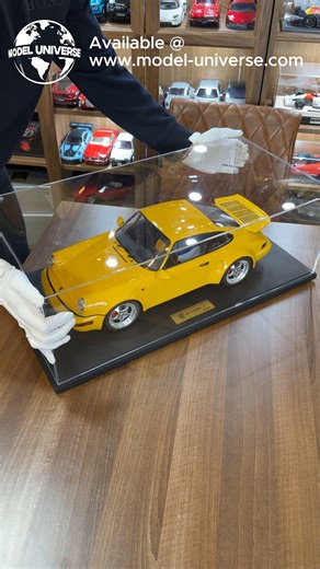 An air-cooled icon in stunning large scale — the Porsche 911 (964) Turbo S in vibrant Yellow, beautifully recreated by GT Spirit. This impressive 1:8 scale model captures the unmistakable wide-body stance of the legendary Turbo S, complete with display plinth and case — a true centrepiece for any Porsche collection. ✅ Huge 1:8 scale — approx. 54cm long! ✅ Limited edition of just 500 pieces ✅ Supplied with display plinth ✅ Includes protective display case ✅ Officially licensed ✅ Made by GT Spirit
