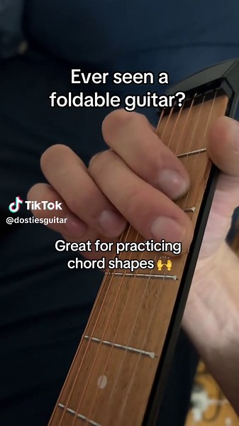 Foldable Guitar: Perfect for On-the-Go Practice!