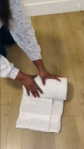 A simple folding trick to save space and keep your towels neat. #TowelHack #HomeHack #LaundryTips