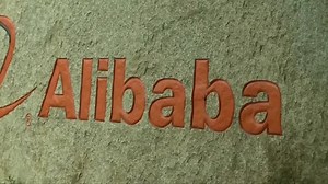Alibaba to sell Intime department store chain at $1.3 bln loss