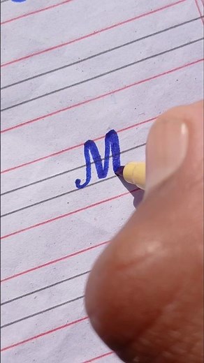 Capital "M" in cursive writing