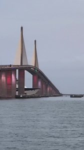 Cruise Ship Passing Under Skyway Bridge