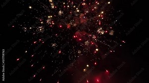 Multiple fireworks exploding at the same time at a fireworks display while I drone captures them. Stock Video