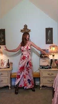 Dainty Rascal dancing in vintage dress