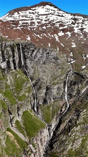 clip-4000897283-vertical-drone-view-mountain-shelter-bivacco-piano
