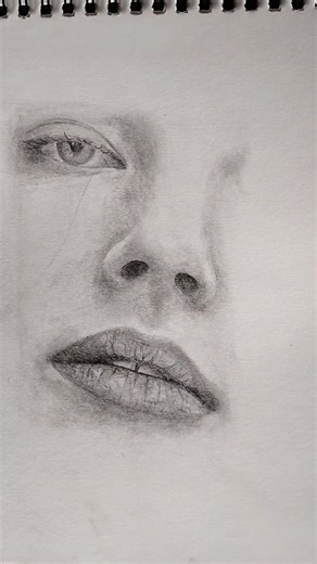 Bringing a face to life with graphite #art #drawing #portrait #shorts