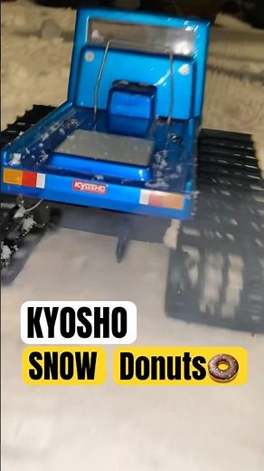 Snow Track RC Vehicle In Snow Does Donuts For Fun Kyosho Nitro Blizzard