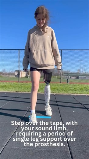 “Follow these progressions to improve your single leg balance: ➖Stepping over tape: This unilateral weight-bearing exercise helps strengthen and train the muscles inside your socket necessary for stance phase control. Using the tape helps serve as a visual cue that you are clearing your foot over a threshold, mimicking the action of stepping over obstacles encountered during daily activities. 📦 Step/box tapping: As you tap your foot onto the step, your body experiences dynamic shifts in weight 