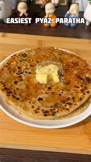 Sangeetha Sharma on Instagram: "Easiest pyaz paratha recipe 😋 Follow for more recipe @ghar_ka_khana_vlog #instagood #reels #instagram #paratha #onion #onionparatha #pyazparatha #paratharecipes #parathalovers #recipe #food #cooking #trendingreels #viralreels #viral #explore #trending #explorepage #foodporn #love #instafood #recipes"