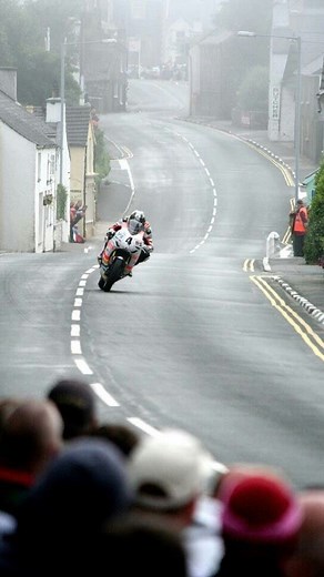 RENNFRAMES® on Instagram: "The Isle of Man TT (Tourist Trophy) is one of the most famous and dangerous motorcycle races in the world. Held annually on the Isle of Man, a self-governing British Crown dependency, the race takes place on public roads closed to the public for the event. The course, known as the Snaefell Mountain Course, is 37.73 miles long and features over 200 corners, with racers reaching speeds of up to 200 mph. First held in 1907, the Isle of Man TT has a rich history and attrac