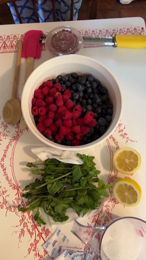 Made some Jacques Pepin summer fruit salad with some amazing sous chefs. #blueberries #raspberries #mint #lemon #sugarpackets