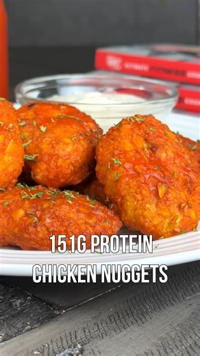 These Buffalo Ranch Chicken Nuggets are an absolute cheat code for hitting your protein macros. So much flavor and 151g protein for the entire plate! 🐓🔥 💪 Macros for entire recipe: 920 calories, 13g fat, 32g carbs, 151g protein. 1. Add ground chicken, breadcrumbs, ranch seasoning, salt, pepper, garlic powder, and onion powder to bowl and combine with hands. 2. In a second bowl, add protein chips, and crunchwith hands. 3. In a third bowl, add two egg whites. 4. Form chicken into nuggets and di