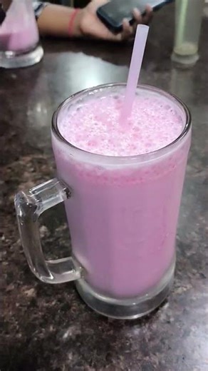 I drink pink milk in this cafe in Kottakuppam village, India.