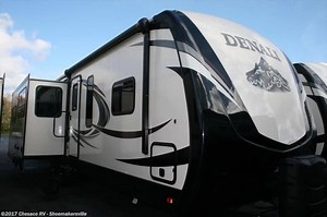 The 2017 Dutchmen RV Manufacturing Denali 325RL rear living travel trailer has all the room and comforts from home to make any #camping trip enjoyable. This unit features triple slides for added interior space, a convenient island, and front bedroom, plus more. See it here: https://goo.gl/SqwPtt | Chesaco RV