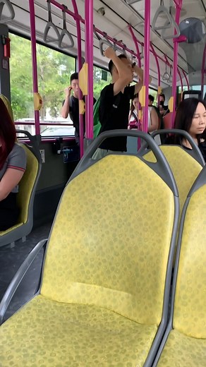 A man suddenly burst out singing the song "Home" on Bus No.16. One of the passengers joined in the chorus and people clapped at the end of the song. But is this a public nuisance or just a way to express love for Singapore? Should he do this on the bus? What will you do if you encounter this? | Singapore100