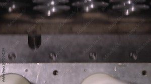 Production plastic package and pack. Goods manufactured of plastic packing from environmentally friendly and safe for food storage materials. Work on high performance and precision machinery. Close up