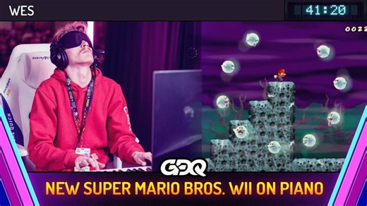 Speedrunner beats New Super Mario Bros. Wii while playing the piano and using controllers strapped to his body...and then does it blindfolded